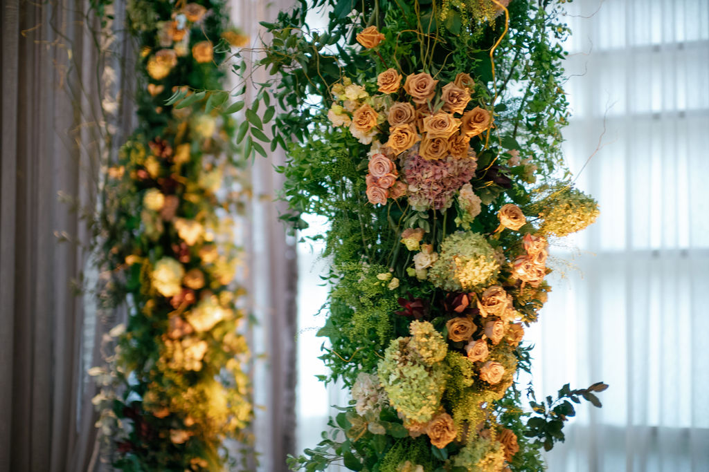 Close-up of custom wedding ceremony florals by Topher Mack Floral & Events